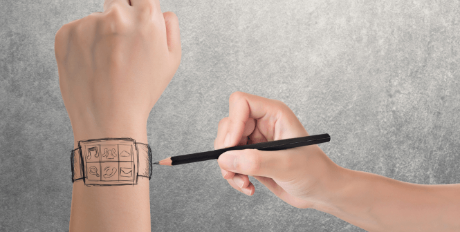 a person's hand holding a pen and drawing a watch