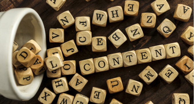 a close-up of a wooden blocks with letters