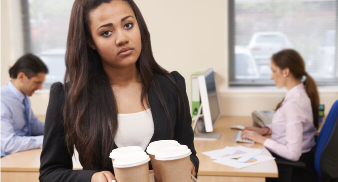 a person carrying cups of coffee