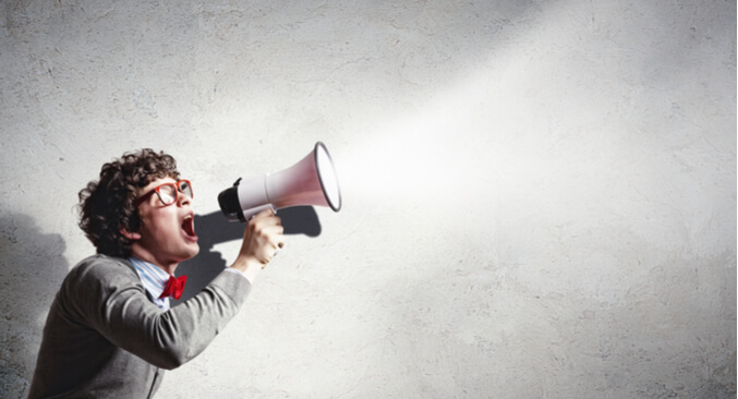 a person holding a bullhorn