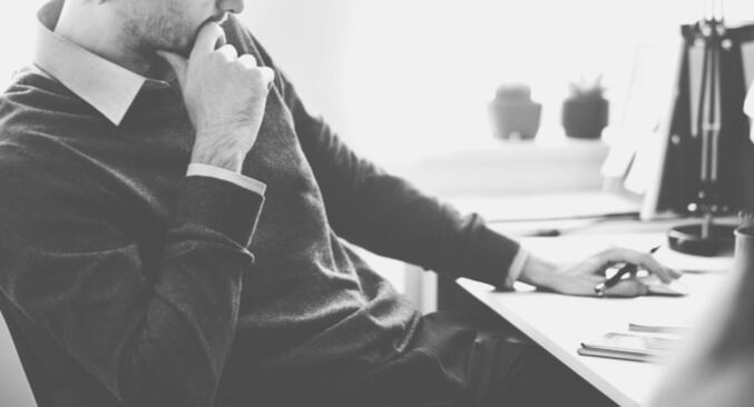 a man sitting at a desk