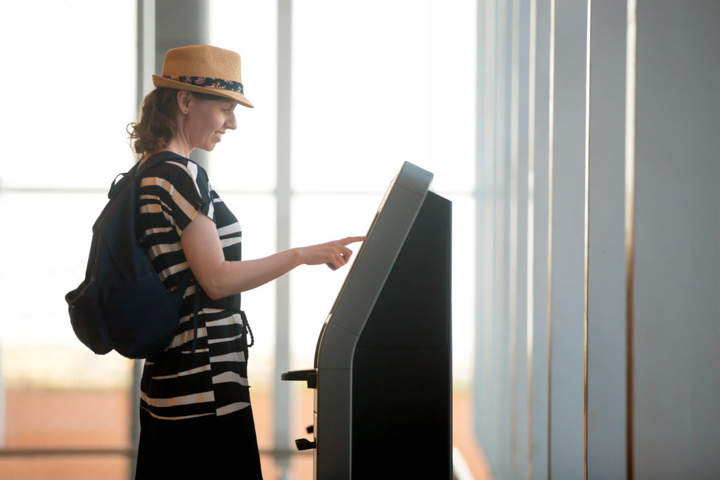 a woman looking at a computer