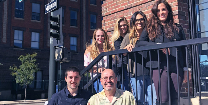 a group of people posing for a photo