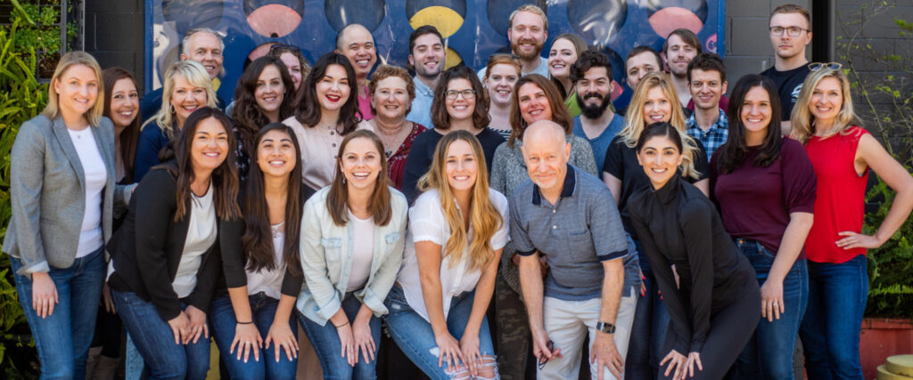 a group of people posing for a photo