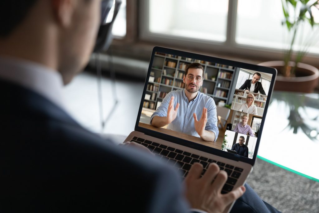 a person holding a laptop