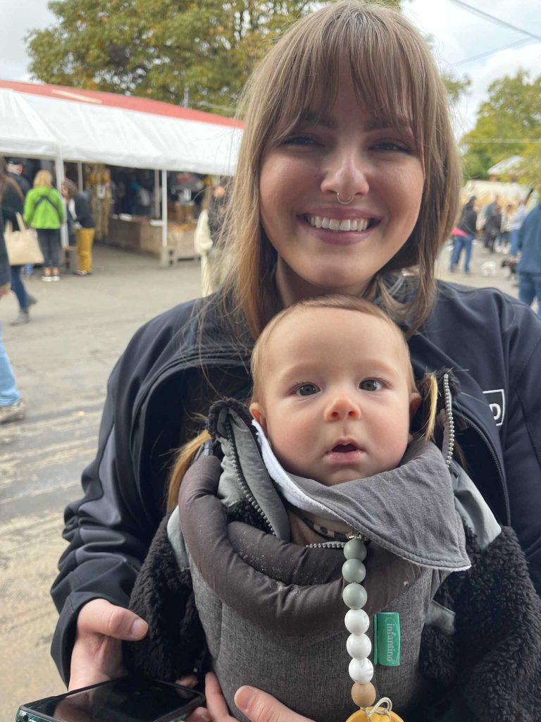 a person holding a baby